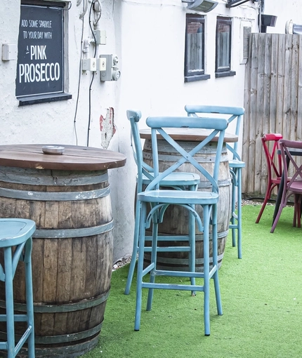 The exterior beer garden seating at The Bull.
