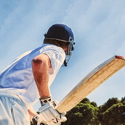 AdobeStock_Sports_Cricket_Cricketer-With-Bat_People_2022.jpeg