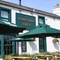 The exterior facade and beer garden seating area at The Yorkshire Grey.