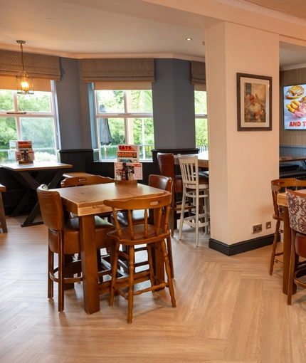 The interior restaurant seating area with TV, at The Star in Gillingham.