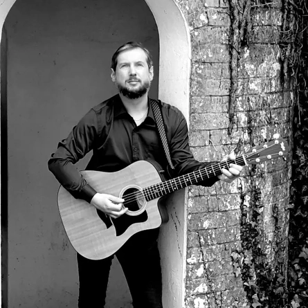 An image advertising a live music with Martin Cuthew What's On event at The Crown.