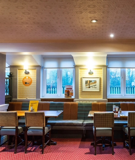 interior of the restaurant with seating area