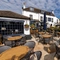 Exterior of the pub with the beer garden in show
