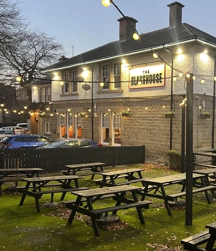 The exterior beer garden and seating area at the Glasshouse.