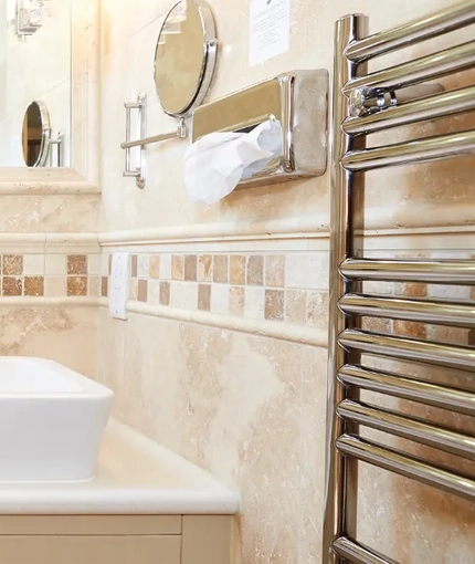 The interior hotel bathroom with his and hers sinks at the Fox.