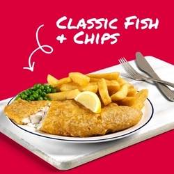 A banner promoting the Classic Fish & Chips meal at Hungry Horse venues. The banner shows fish, chips and peas served on a plate with a slice of lemon and the plate sits on a wooden serving board next to a knife and fork.