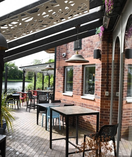 Exterior seating area by the water