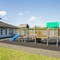 Exterior play area of a pub with a seating area.