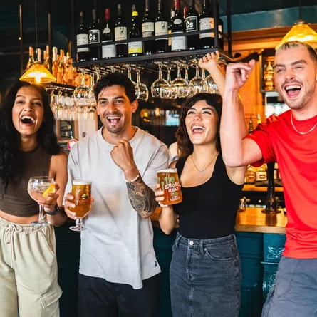 Guests celebrating in the pub