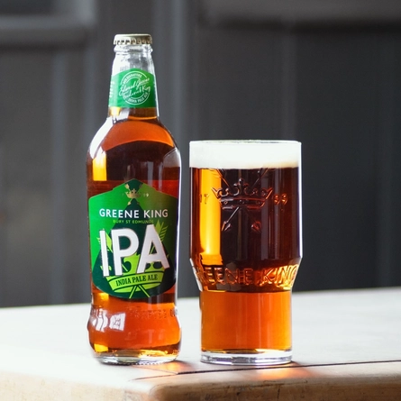 A bottle of Greene King IPA