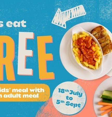 A banner promoting 'Kids-Eat-Free' at Flaming Grill venues.
