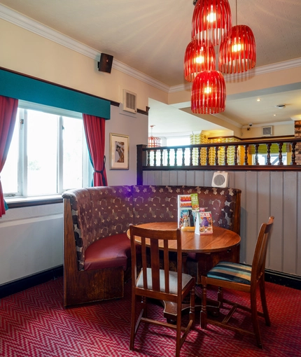 Interior dining area of a pub.