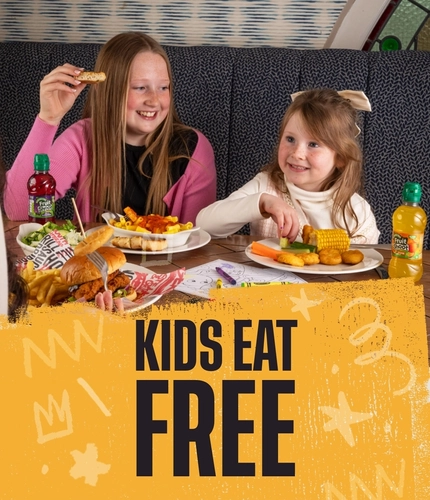 A banner promoting kids-eat-free at Flaming Grill venues.
