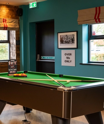 The interior pub games pool area at the Hem Heath.