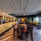 Interior bar and seating area of the Cricketers pub in Southwick