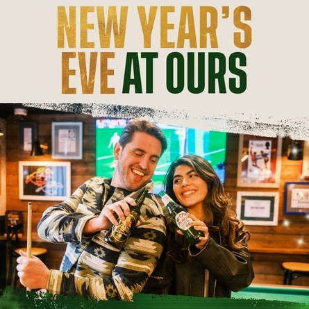 A Christmas banner promoting 'New Years Eve' at Flaming Grill venues.