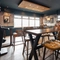The restaurant area of the Cocked Hat, with a TV on the wall.
