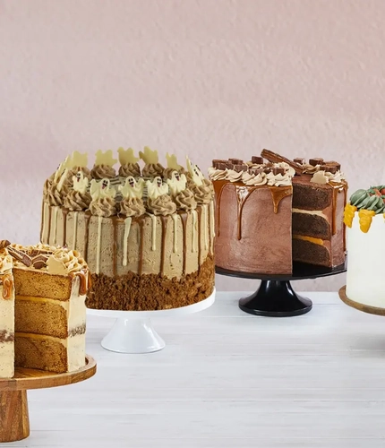 A group image of Farmhouse Inn cakes including the 'Boo-Scoff' cake for Halloween