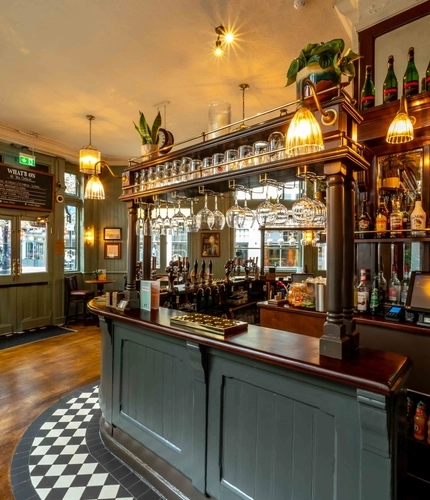 The bar with seating at The Crown.