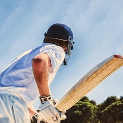 AdobeStock_Sports_Cricket_Cricketer-With-Bat_People_2022.jpeg
