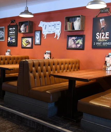 Interior dining area of a pub.