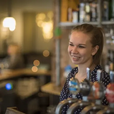 team member at the bar