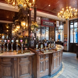 The wood panelled bar of The Salisbury in Covent Garden.