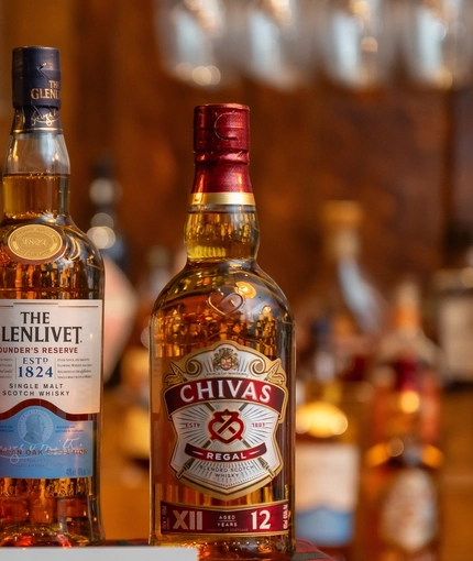 An image of a display stand showing 3 different bottles of Whiskey within the interior function room during a Burns Night Event at The Crabtree.