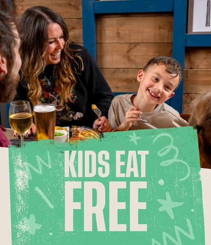 A graphic promoting "Kids Eat Free" at Flaming Grill.