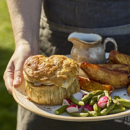 An image showing the chicken, leek and cheese pie dish served on a plate at Chef & Brewer.