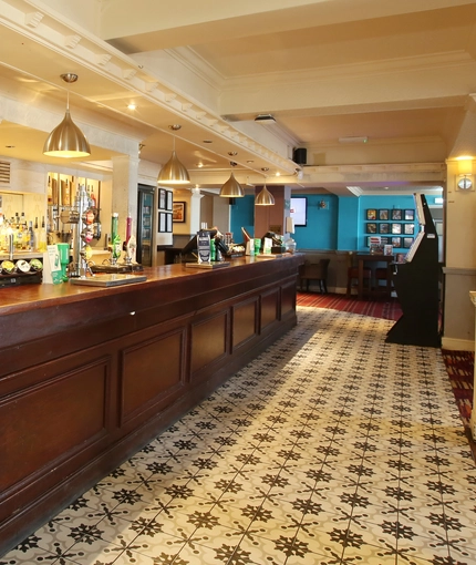 Interior bar of a pub with a gambling machine.