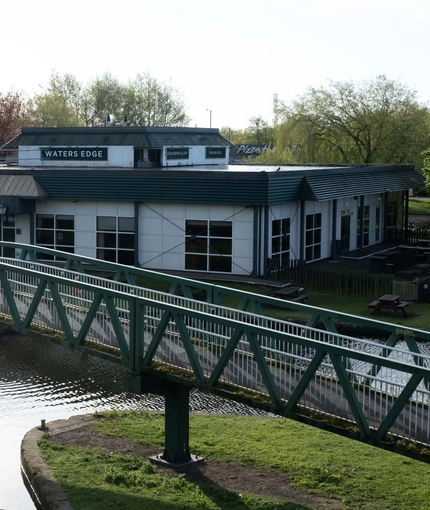 External view of a pub by the water