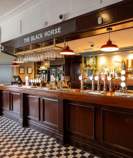 The interior bar area at the Black Horse.