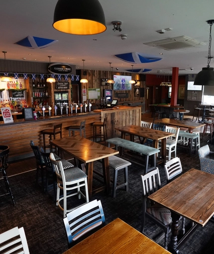 interior of the restaurant with seating area and bar