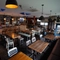 interior of the restaurant with seating area and bar