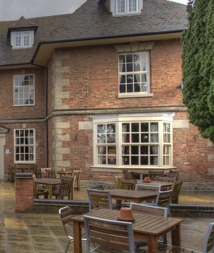 Rear outdoor seating area of a pub