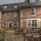 Rear outdoor seating area of a pub