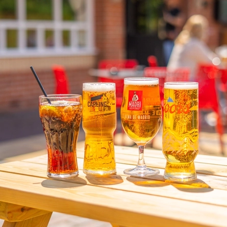 An exterior shot of drinks served in a beer garden at the Mill House in Stretton.