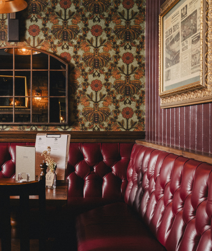 The interior restaurant and seating area at the Three Tuns.