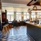 The bar and interior restaurant seating area at The Good Intent in Hornchurch.