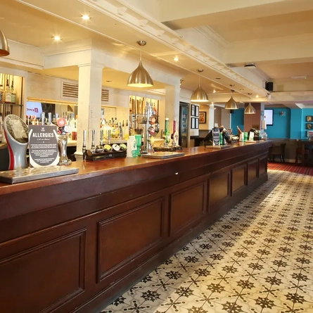 Interior bar of a pub with a gambling machine.