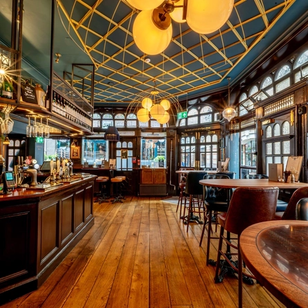 The bar and interior seating area at The Blue Posts.