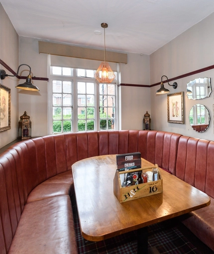 Interior dining area of a pub.
