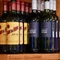a close-up of wine bottles in a bar