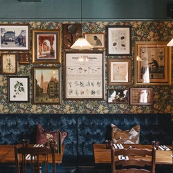 The interior restaurant seating area and decor of the Sherlock Holmes.