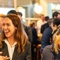 An image of a group of friends sat within the interior seating area enjoying various drinks at The Kings Stores.