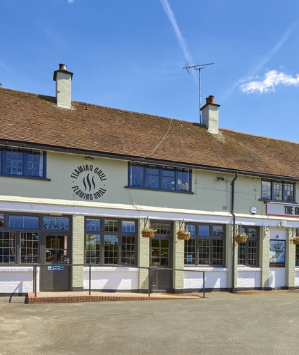 The exterior facade, signage and accessibility ramp of The Good Intent in Hornchurch.