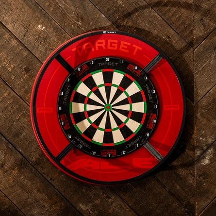 A close up view of a dartboard on a wooden wall inside the Wooden Bridge.