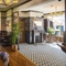The interior restaurant seating area with feature fireplace at The Crown & Horseshoes.