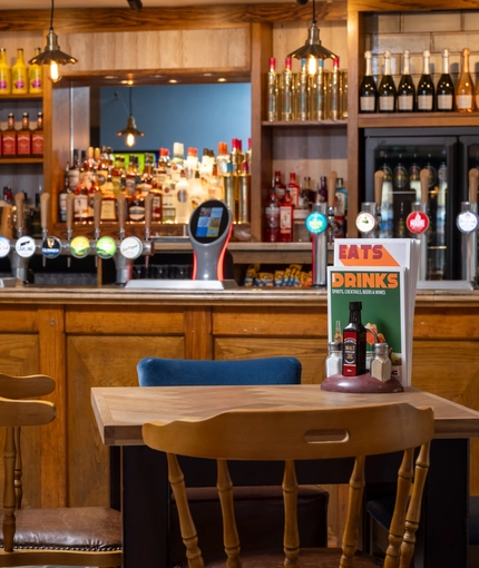 The interior restaurant, seating area and bar at the Woodlands Edge.